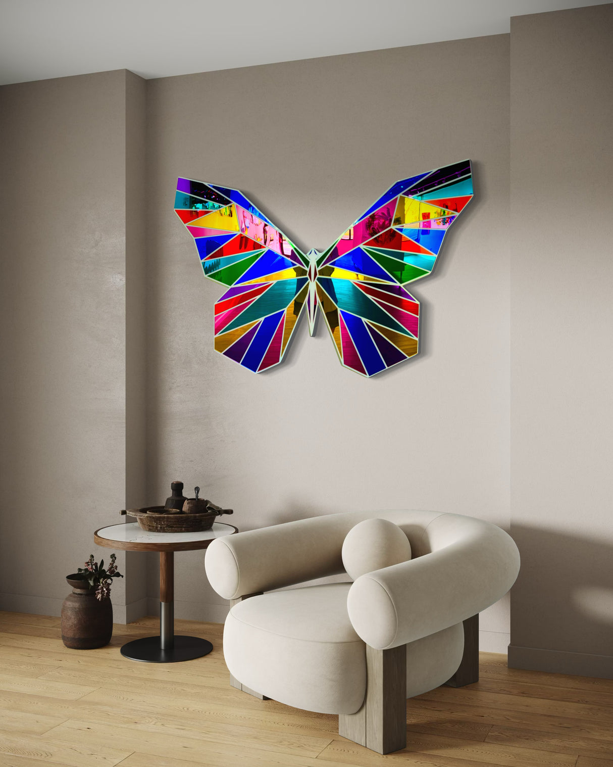 The uniqstiq Mirrored Acrylic Butterfly Contemporary Wall Art hangs above a modern white armchair and round side table, bringing a vibrant touch to the minimalist room.