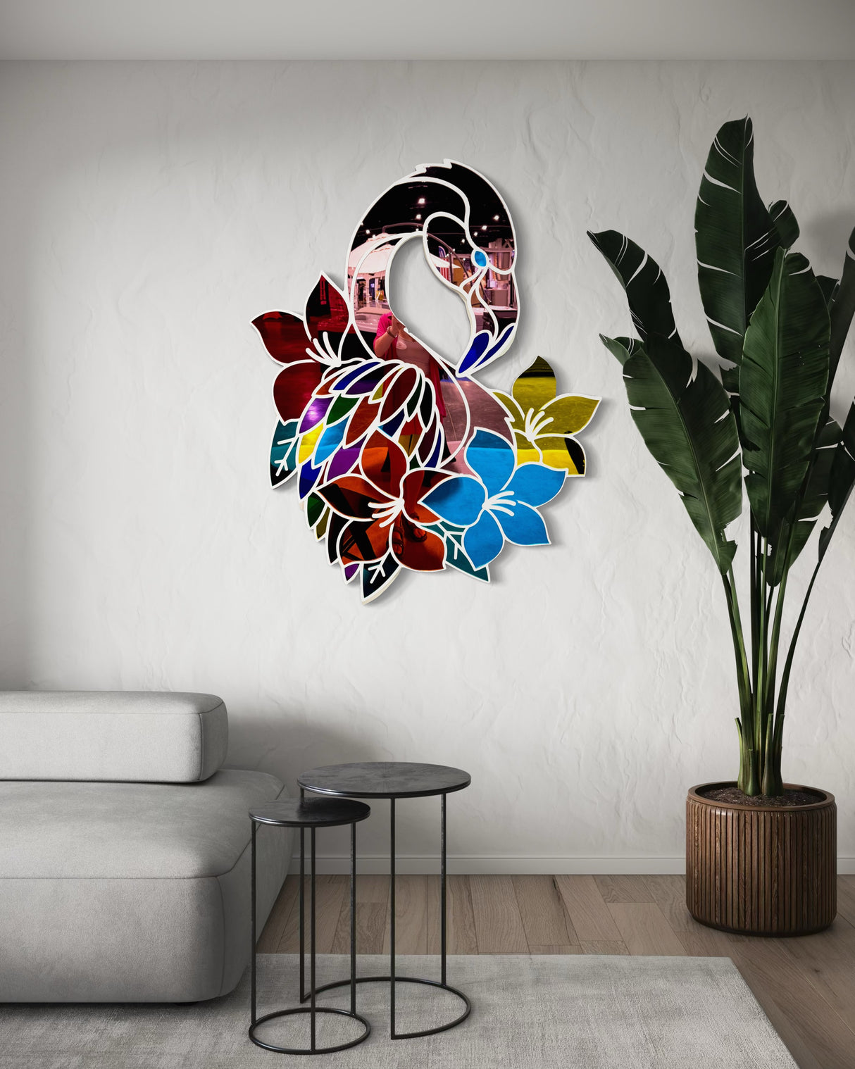 The uniqstiq Mirrored Flamingo wall art adds a vibrant pop of modern decor above a sleek sofa and side tables, creating a lively atmosphere in this bright living room.