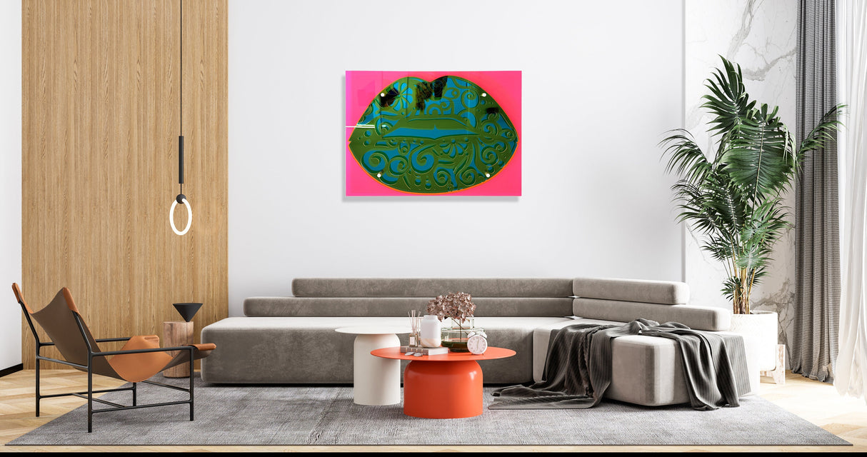 Contemporary living room featuring a gray sofa, orange accents, and uniQstiQ’s Lips Art 3D Acrylic Wall Sculpture—a bold pop art piece that adds modern flair and abstract style to your home decor.
